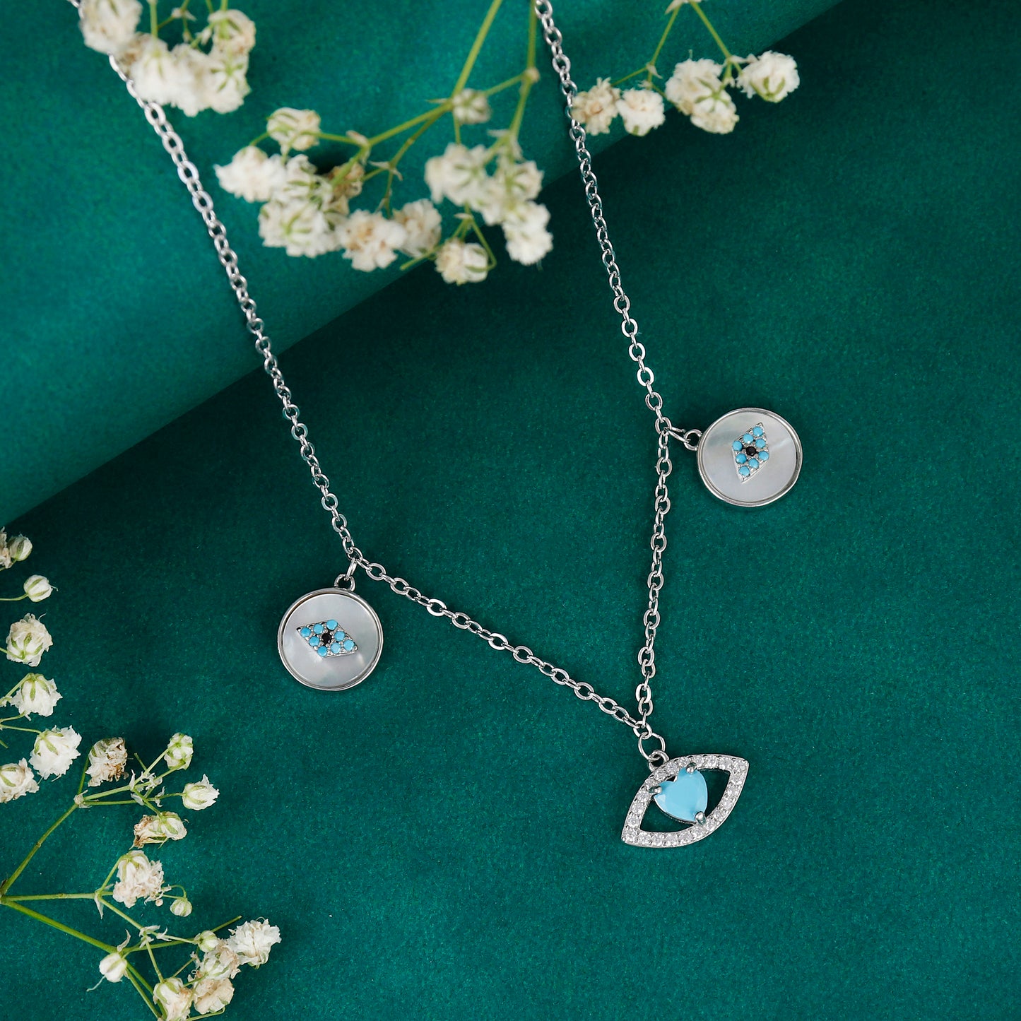 Mother of Pearl inlay and turquoise blue stone accents