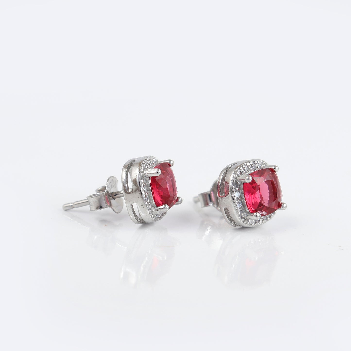 Ruby diamond cut silver earring
