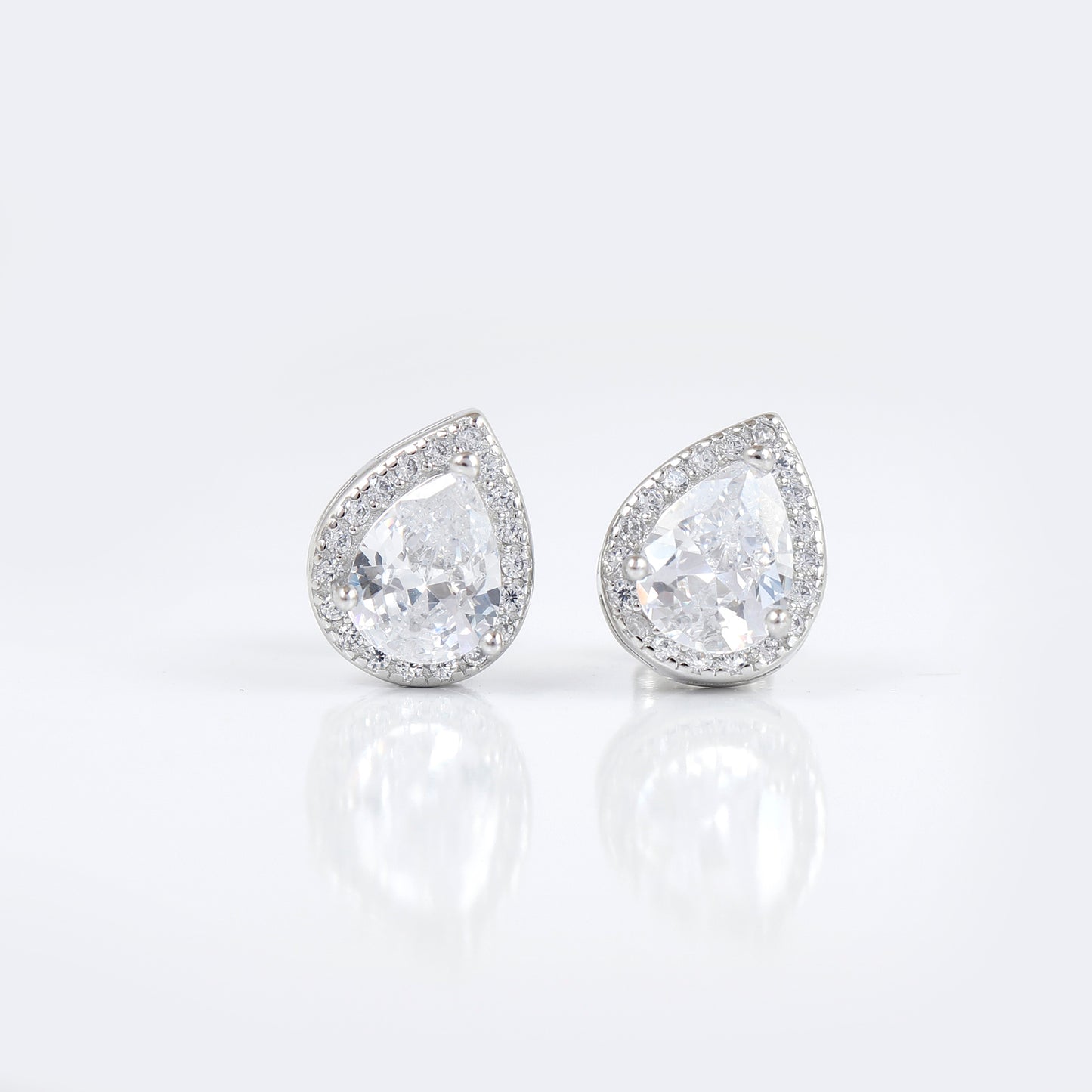 Drop cut silver cut earring