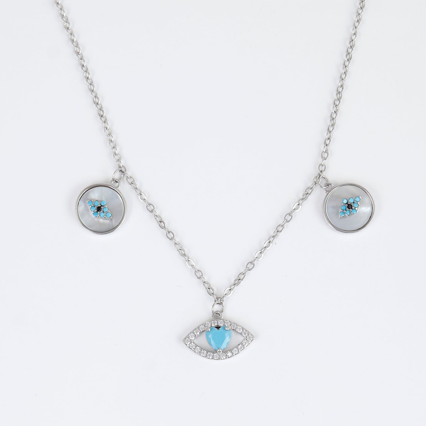 Mother of Pearl inlay and turquoise blue stone accents